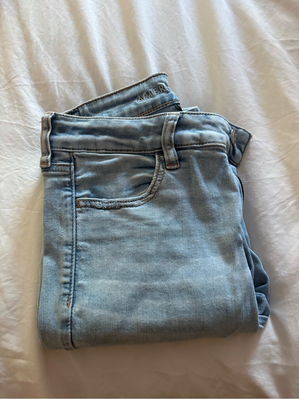 American Eagle next level stretch 
High waisted 8L
Light Wash Denim Jeans